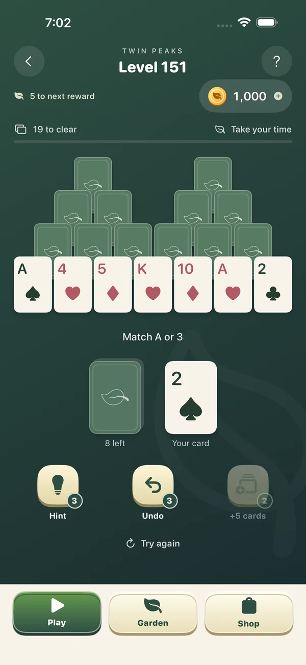 Stillgarden solitaire card table with optional Hint, Undo and Extra Cards assists